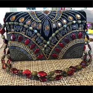 Women’s beaded purse. NWT Has snap closure.